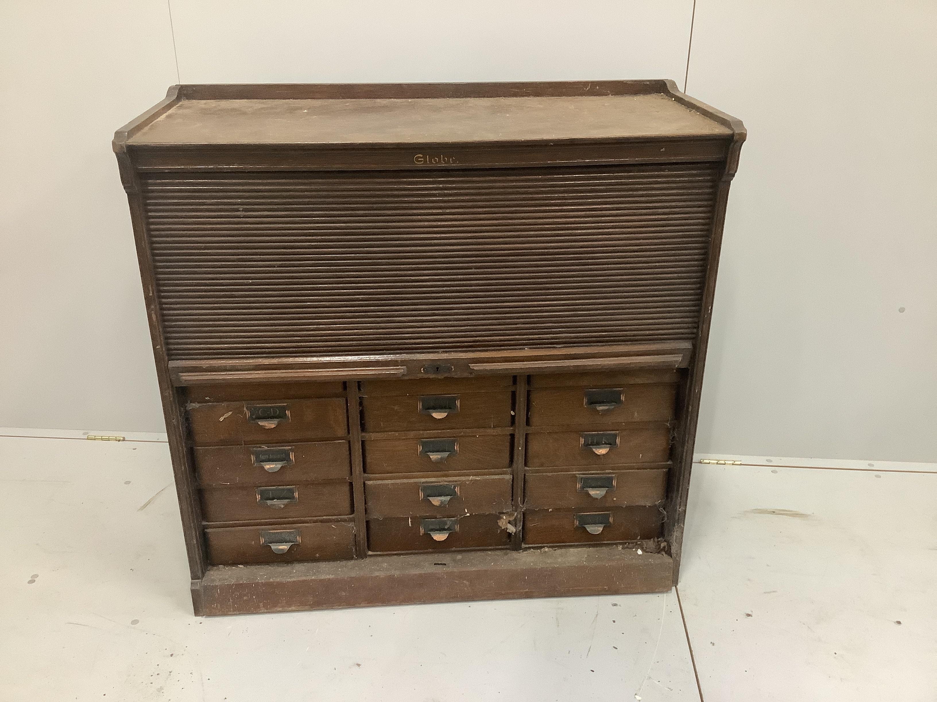 An early 20th century oak Globe Wernicke office filing cabinet with tambour front, width 106cm, height 104cm